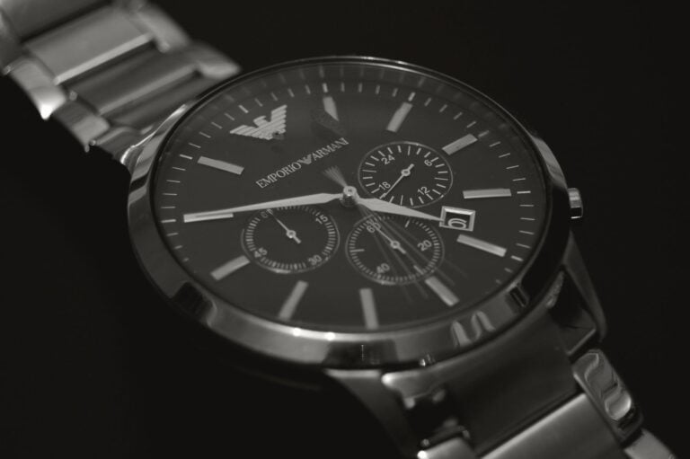 round silver colored emporio armani chronograph watch