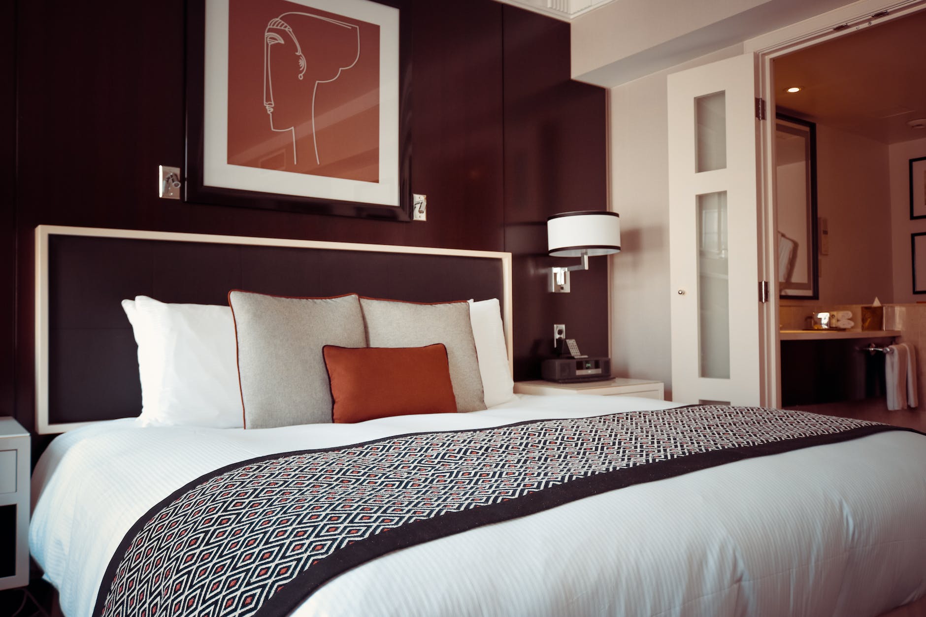 black and grey bedspread on bed and pillow weiche matratzen